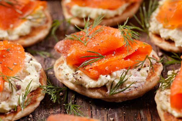 Salmon appetizers on table